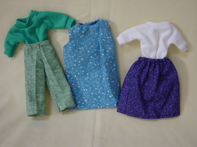 Barbie grn pants,blu dress,purple skirt