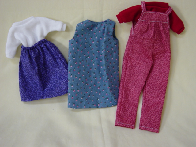 Barbie blu dress,purple skirt,red jumper